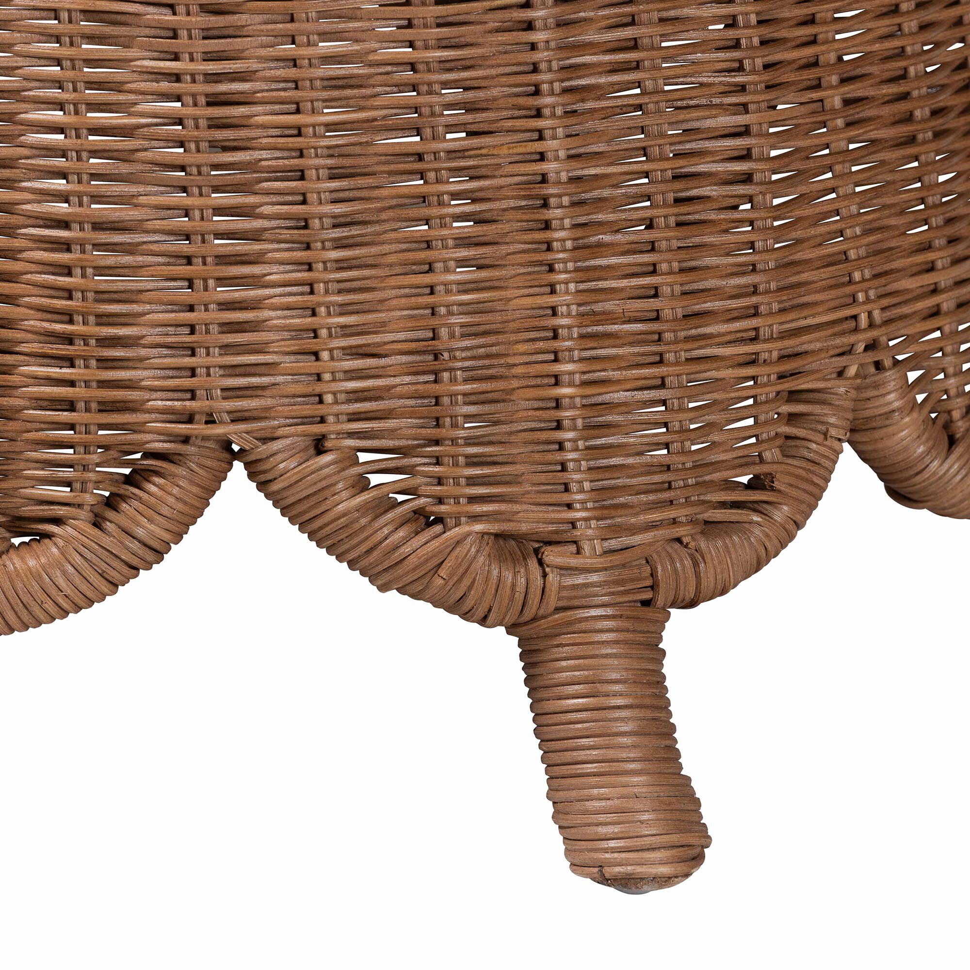 Close-up of rattan footstool leg and base