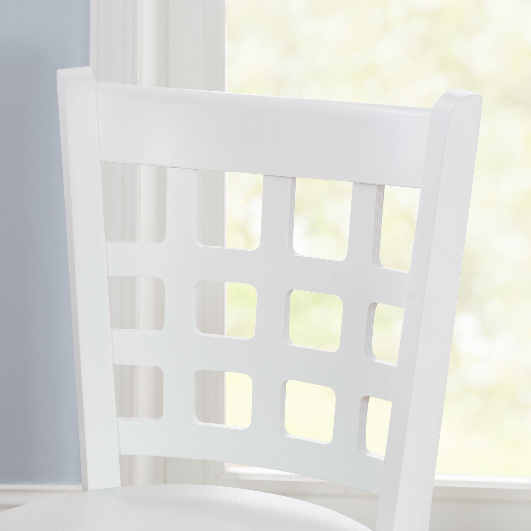 close-up of white stool backrest