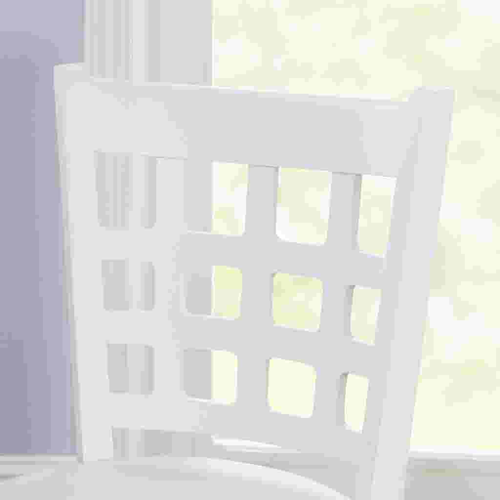 close-up of white stool backrest