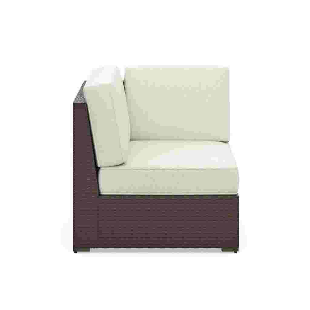 White cushioned outdoor sectional side chair with dark brown wicker frame