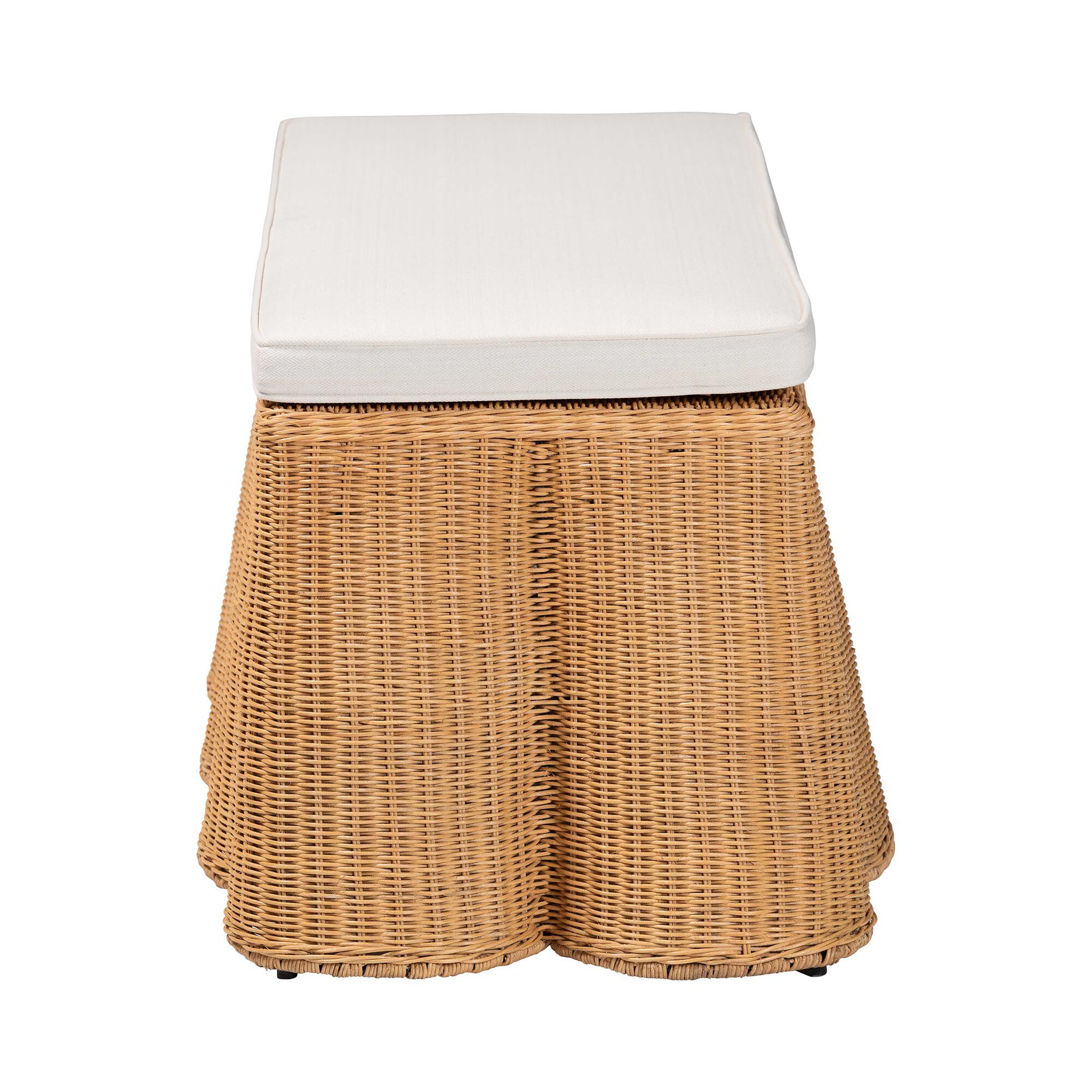 Side view of natural rattan rectangle ottoman with white cushion