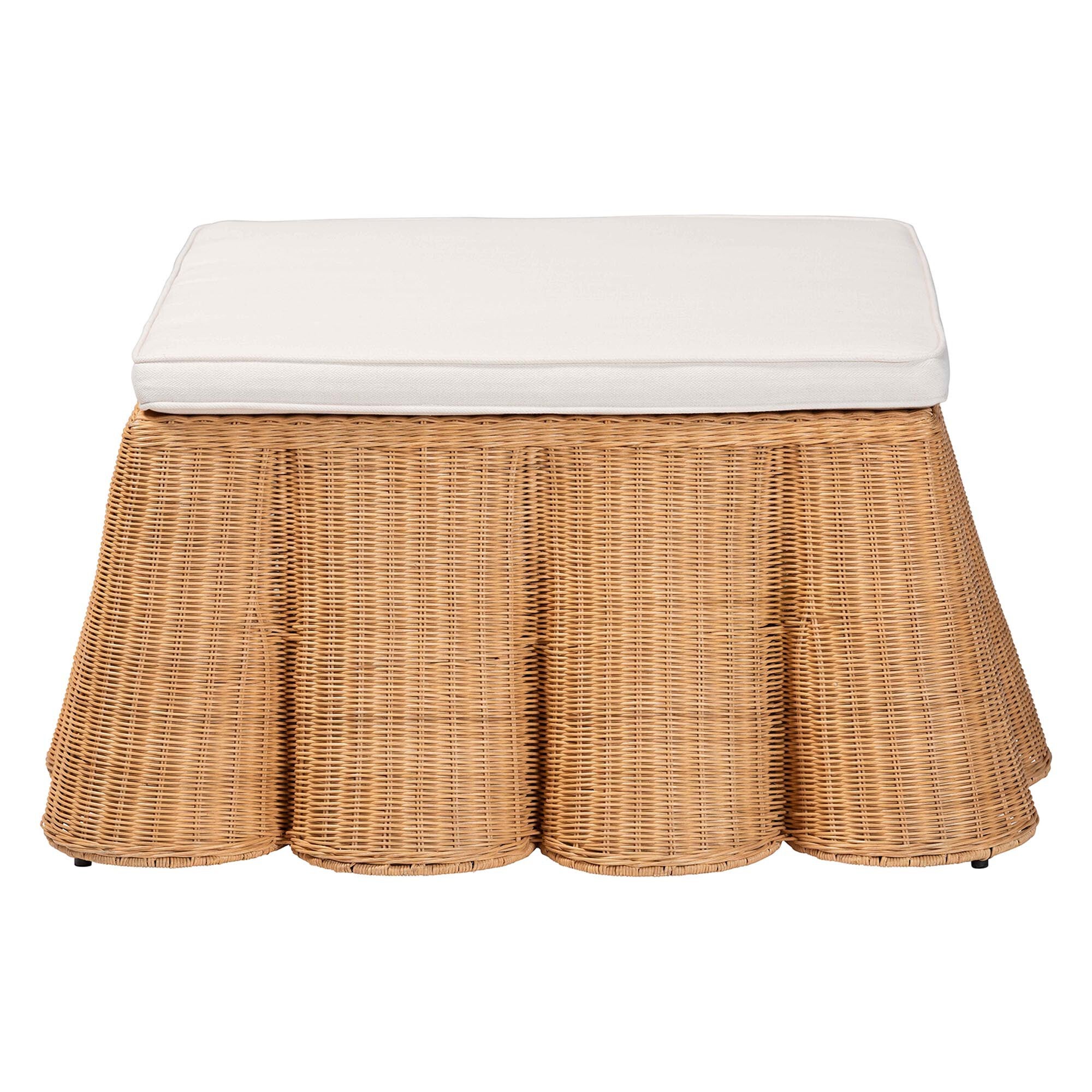 Natural rattan ottoman with white cushion, scalloped skirt