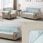 Light blue quilted furniture protectors shown on chairs