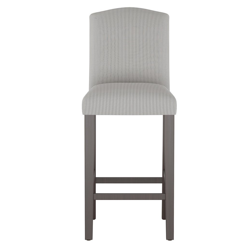 Stripe camelback barstool with gray and white striped upholstery and dark wood legs