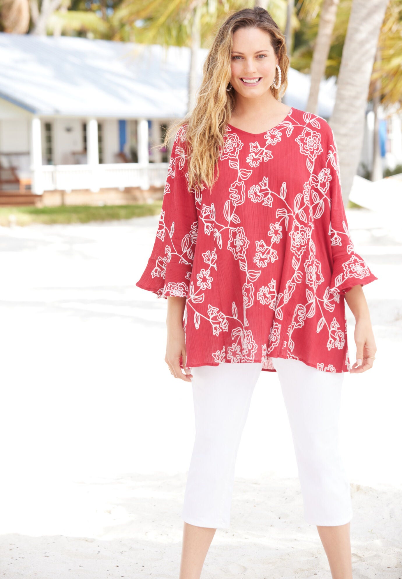 Gathered tunic in cotton print with hand embroidered feather stitch