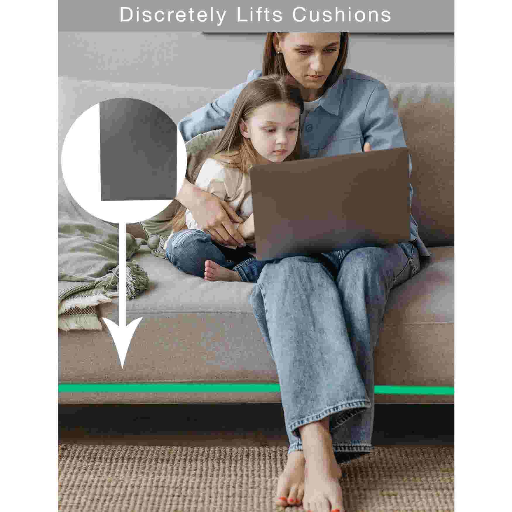 A woman and child on a sofa with a cushion support, showing discreet lifting.