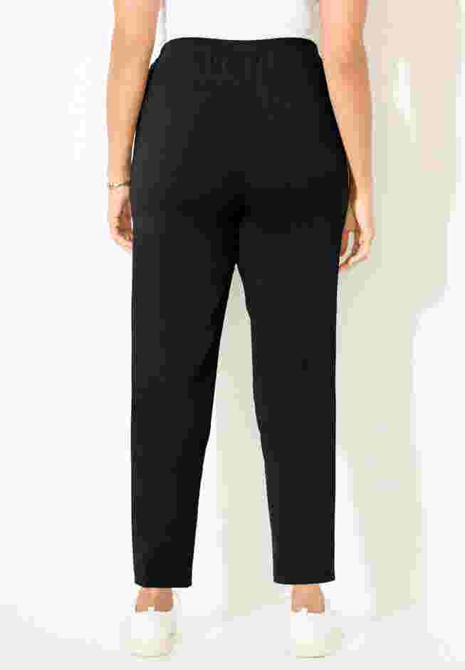 Suprema® Studio Slim Leg Zip Pant image number 1