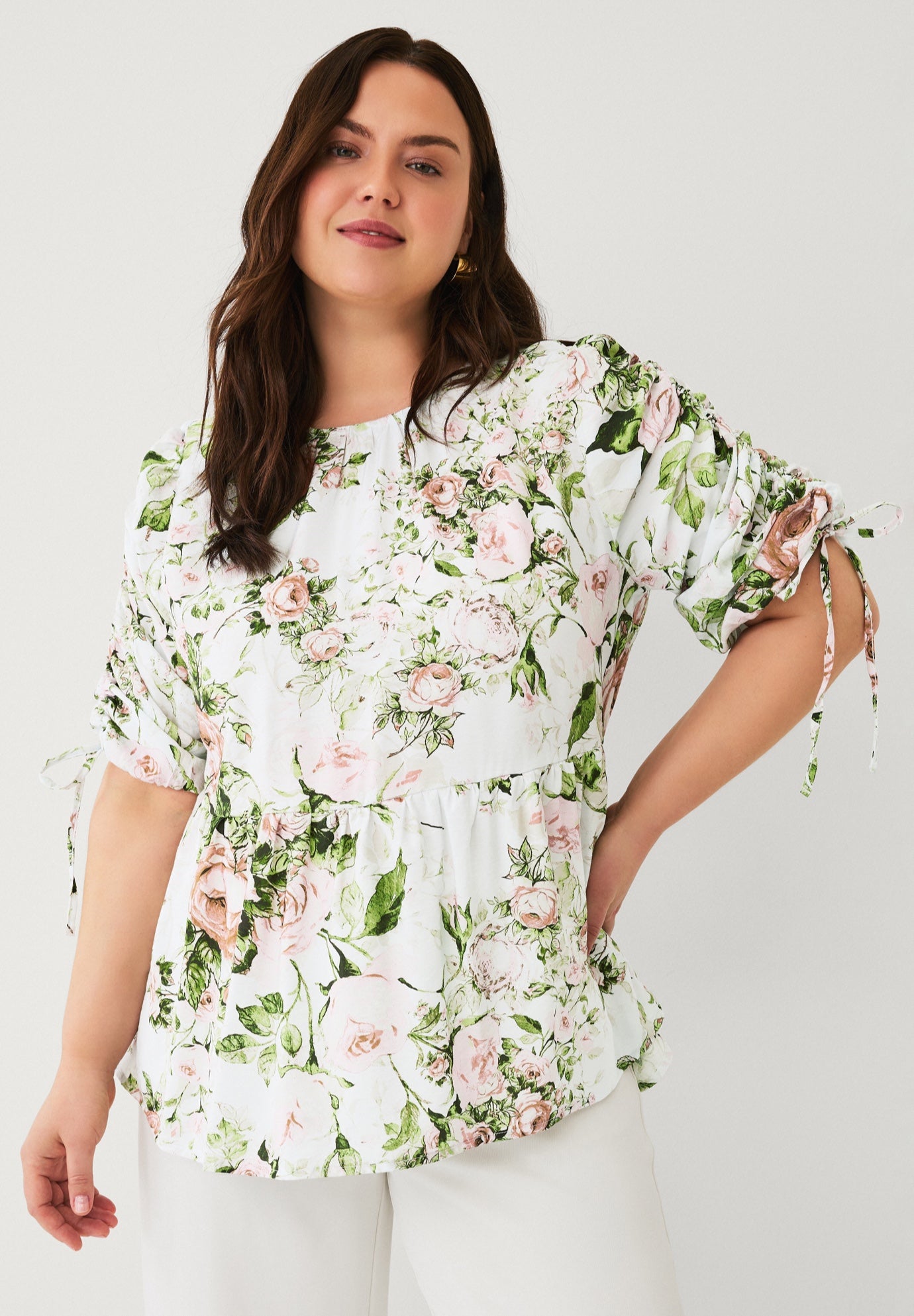 Peplum Tunic With Convertible Sleeves image number 0